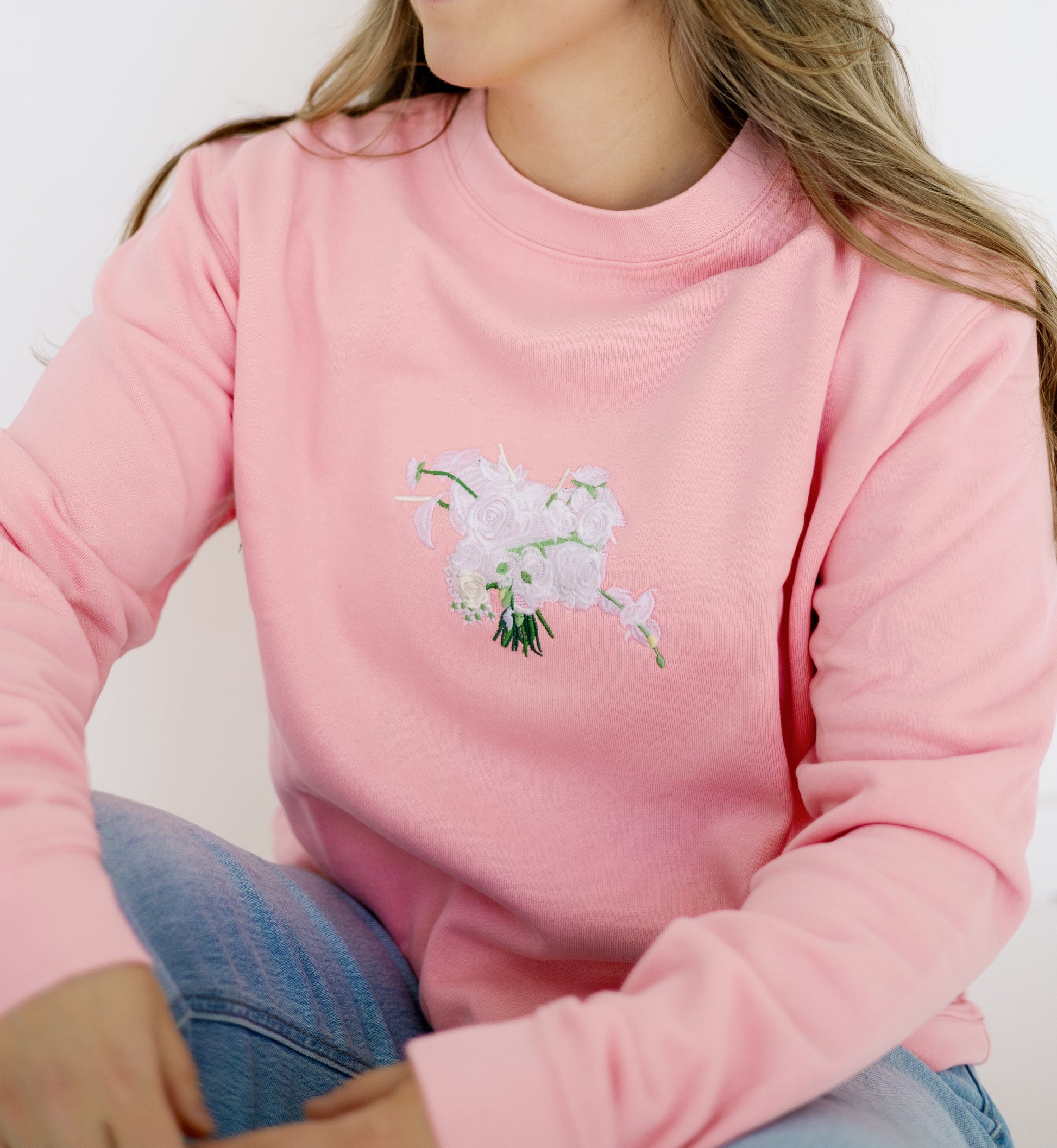 Custom embroidered wedding bouquet crewneck in pink color with white floral design